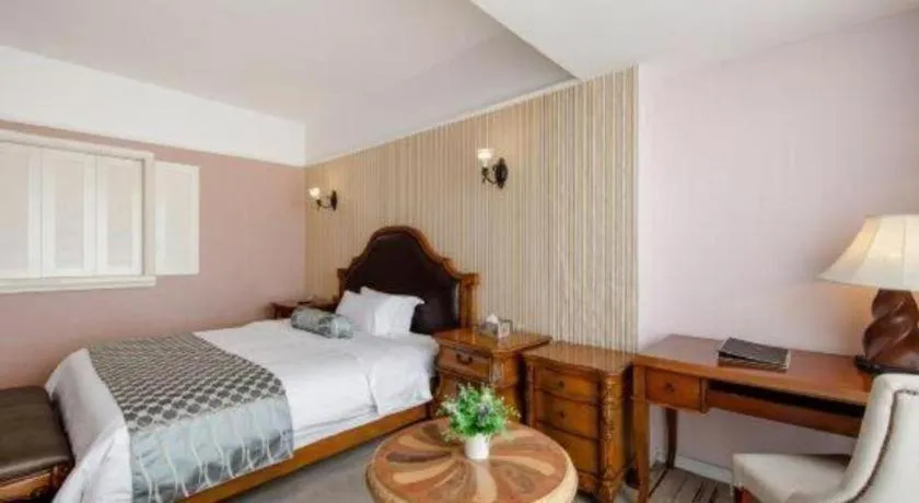 Bed in Guangzhou Impression Hotel