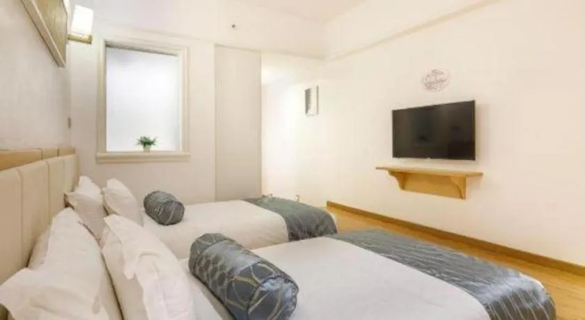 Bed in Guangzhou Impression Hotel