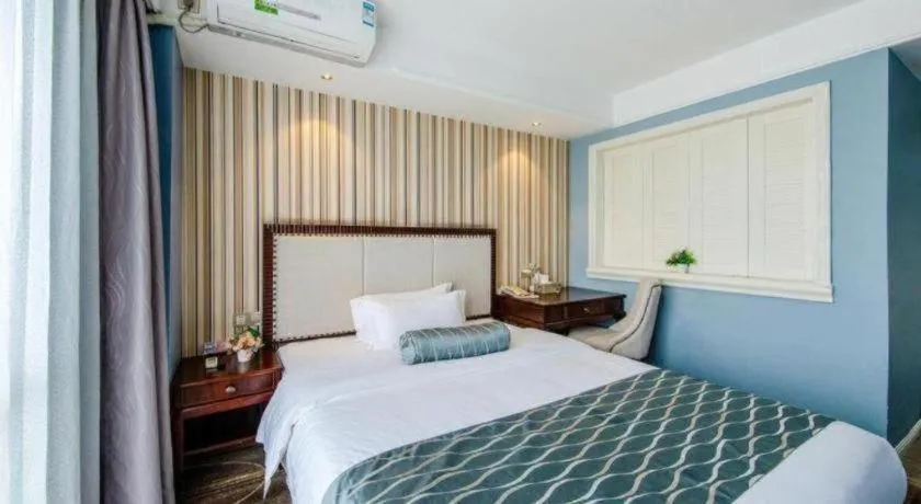 Bed in Guangzhou Impression Hotel