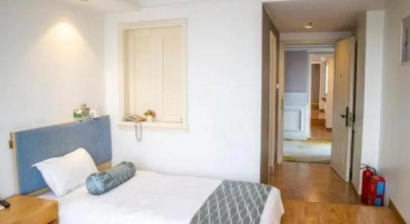 Bed in Guangzhou Impression Hotel