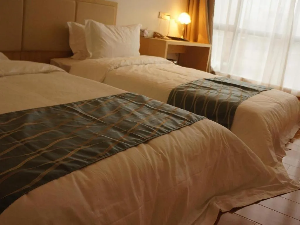 Bed in Guangzhou Impression Hotel