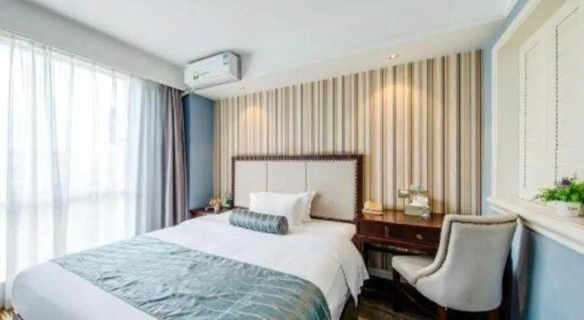 Bed in Guangzhou Impression Hotel