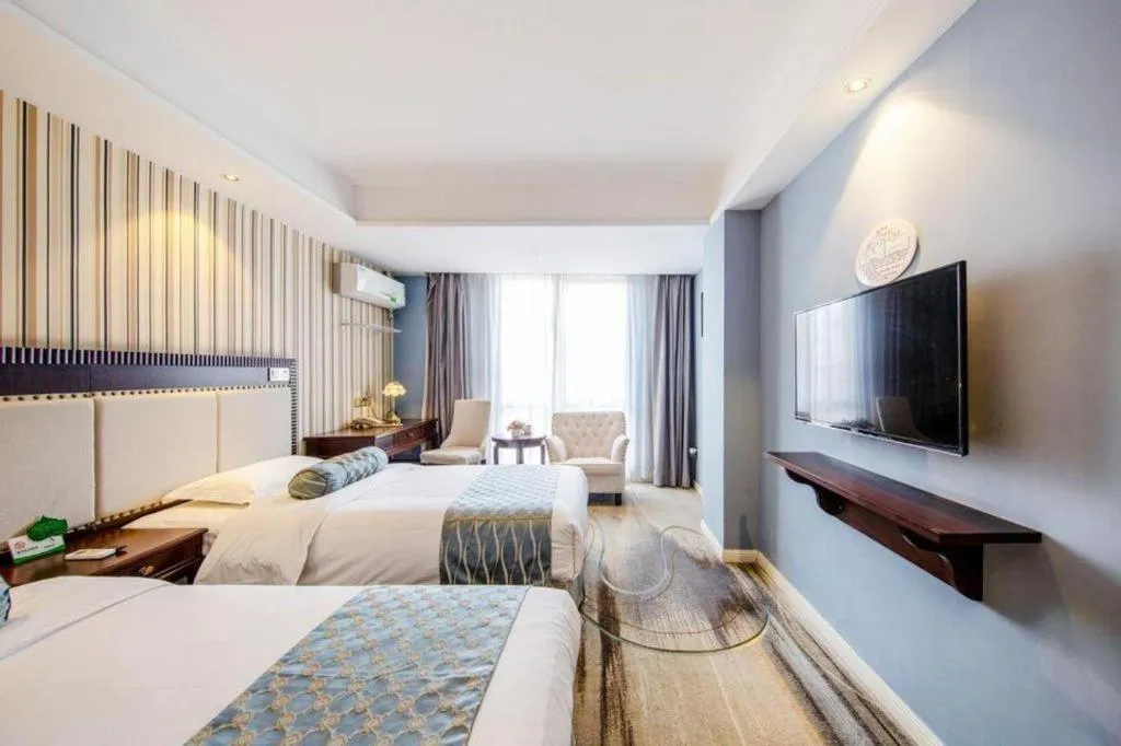 Bed in Guangzhou Impression Hotel