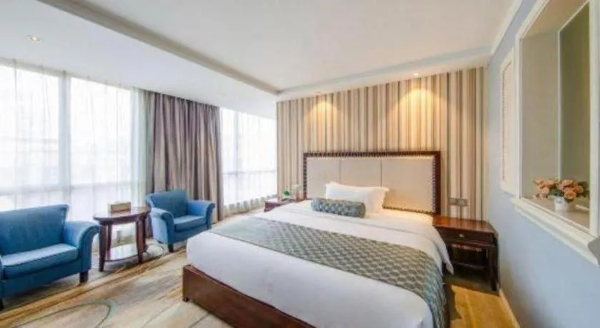 Bed in Guangzhou Impression Hotel