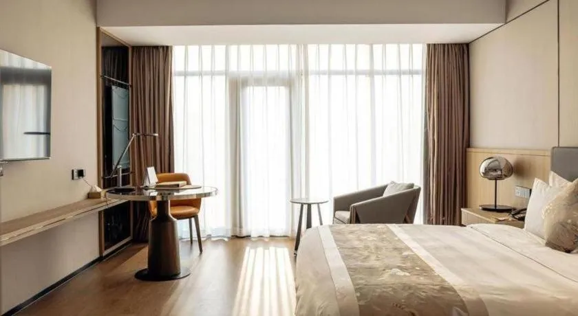 Bed in CITIC Jinling Hotel