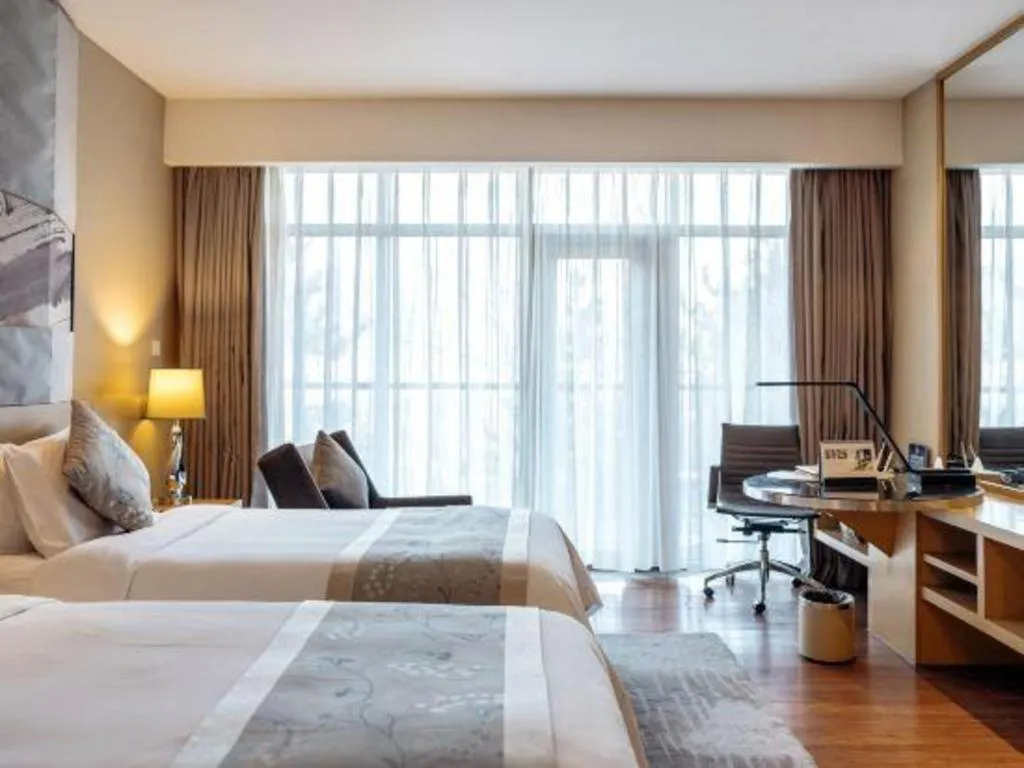 Bed in CITIC Jinling Hotel