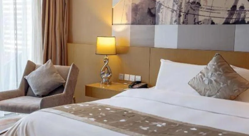 Bed in CITIC Jinling Hotel