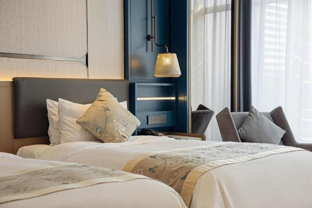 Bed in CITIC Jinling Hotel