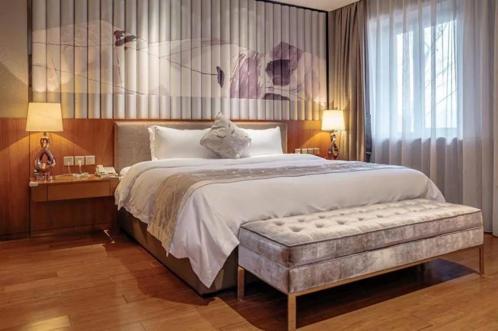 Bed in CITIC Jinling Hotel