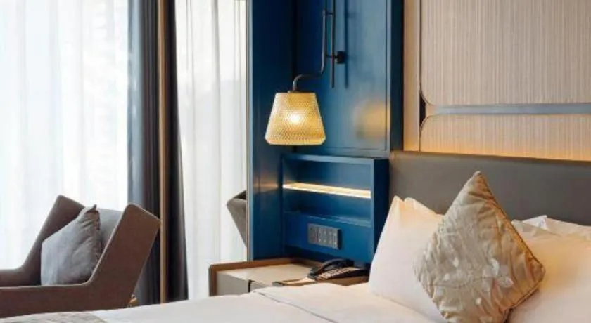 Bed in CITIC Jinling Hotel