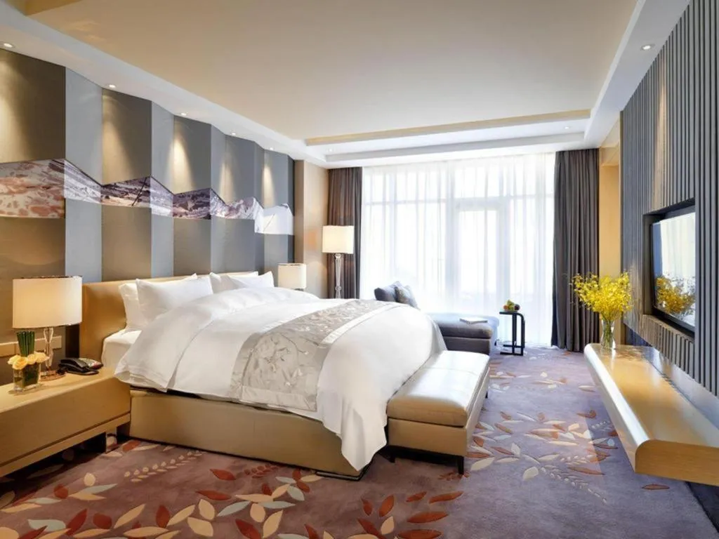 Bed in CITIC Jinling Hotel