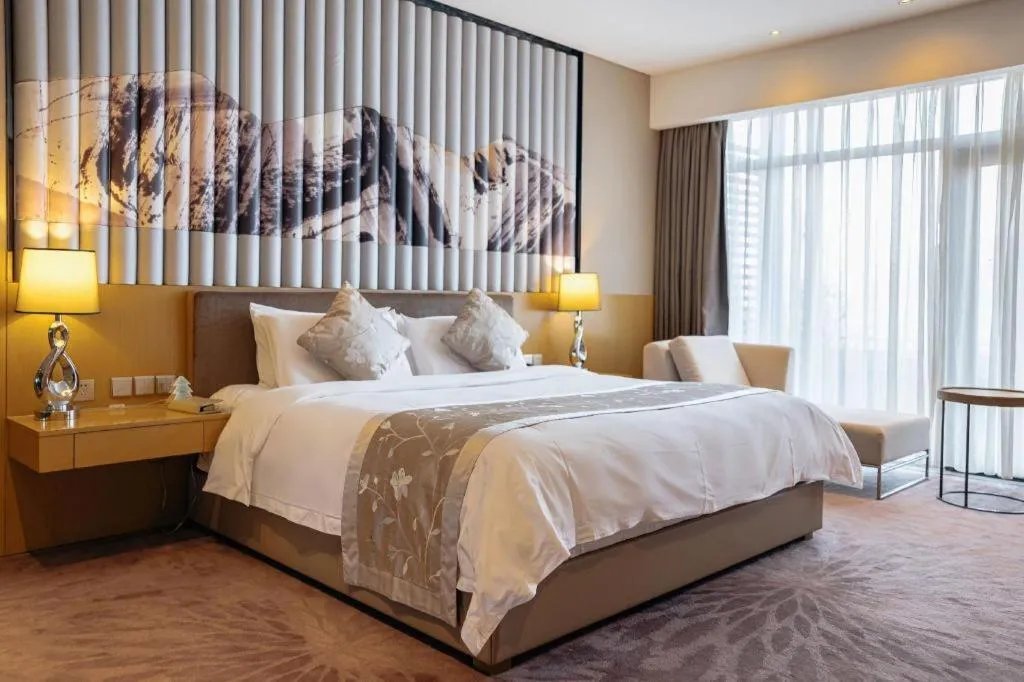 Bed in CITIC Jinling Hotel
