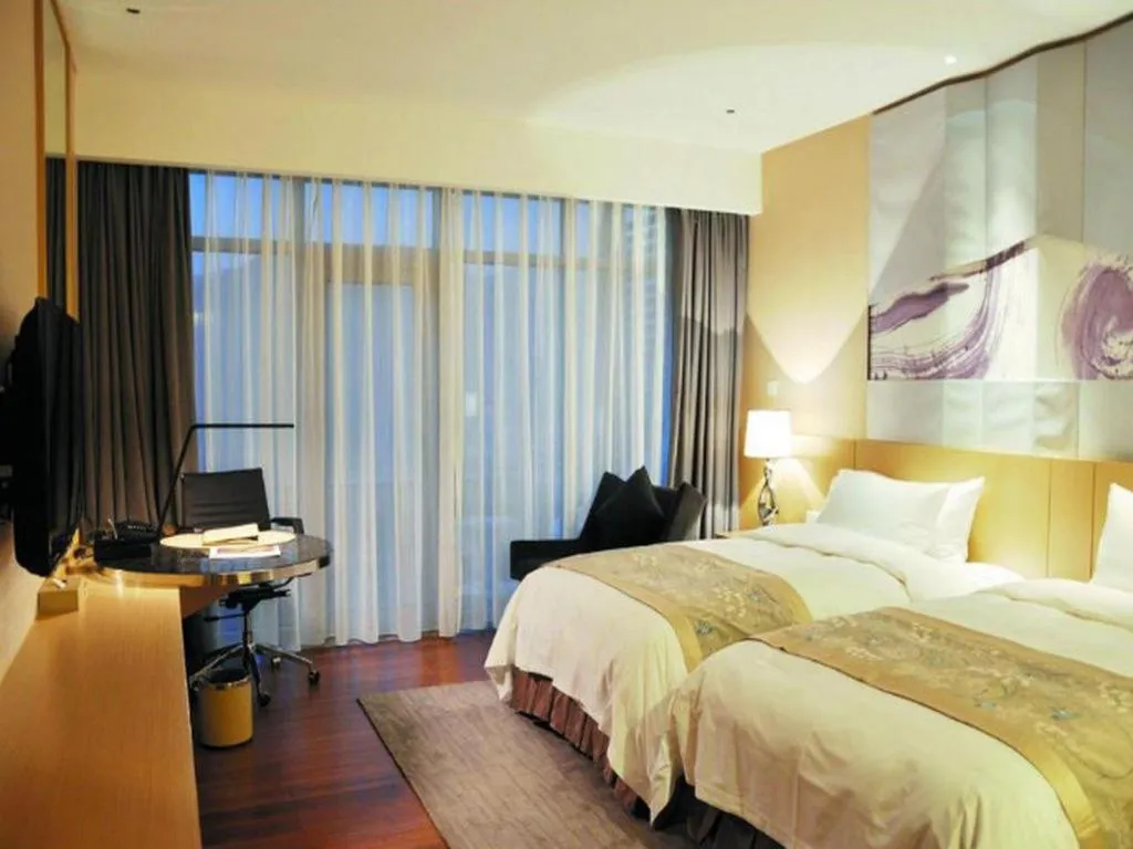 Bed in CITIC Jinling Hotel