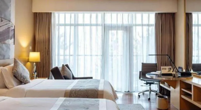 Bed in CITIC Jinling Hotel