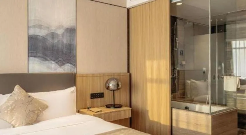 Bed in CITIC Jinling Hotel