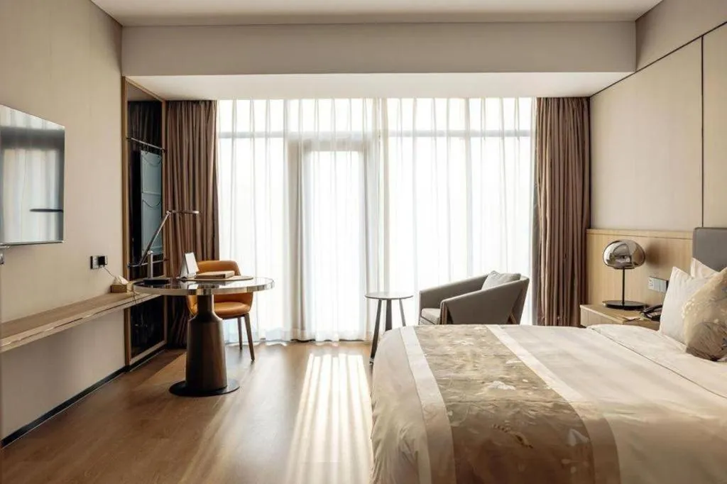 Bed in CITIC Jinling Hotel