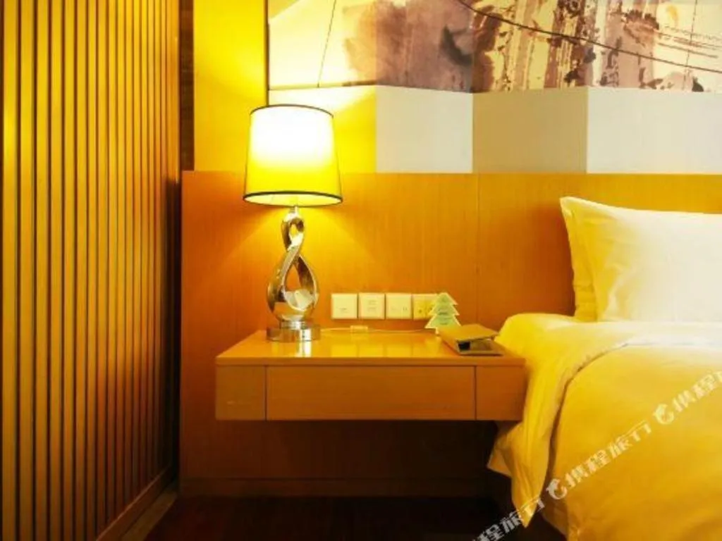 Bed in CITIC Jinling Hotel