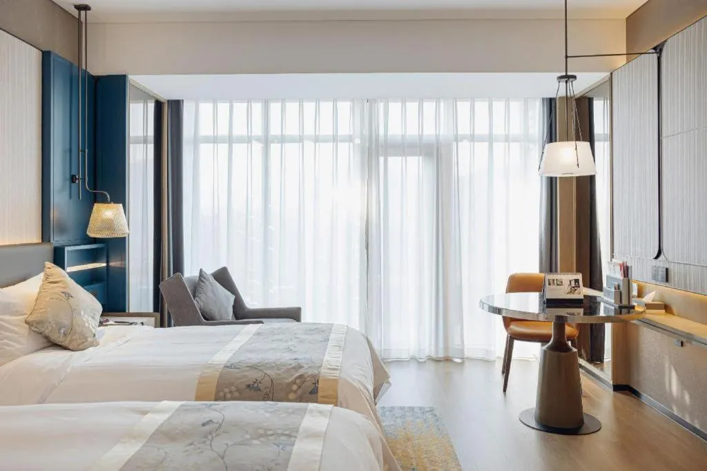 Bed in CITIC Jinling Hotel