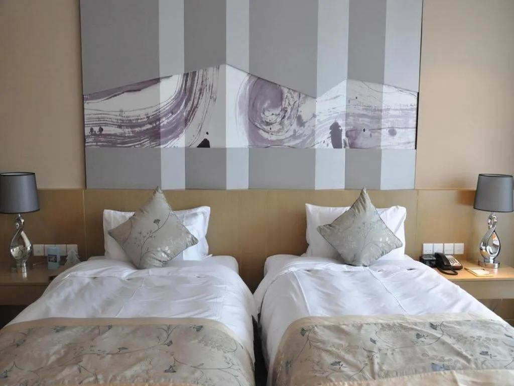 Bed in CITIC Jinling Hotel