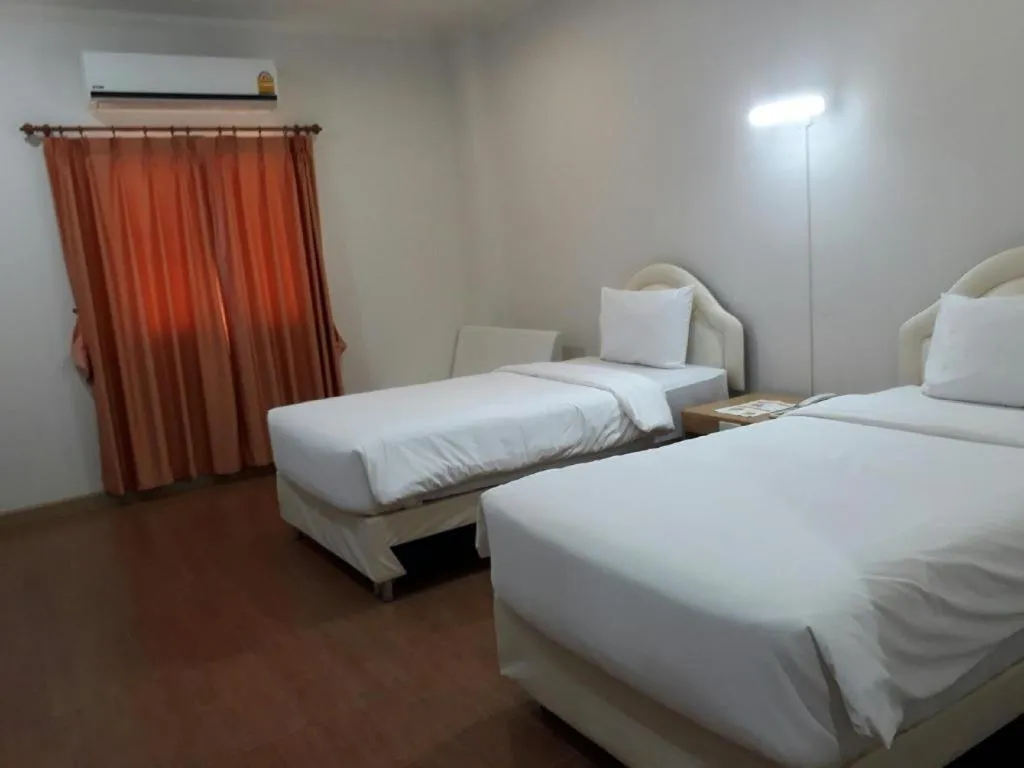 Bed in VC Phayao Hotel