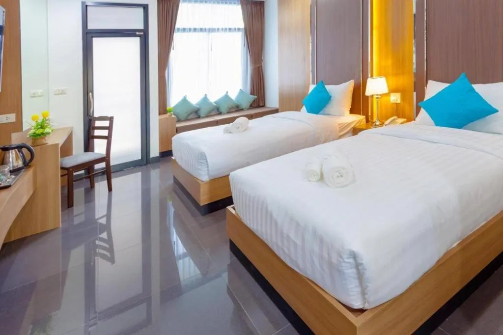 Bed in Thanburi Hotel