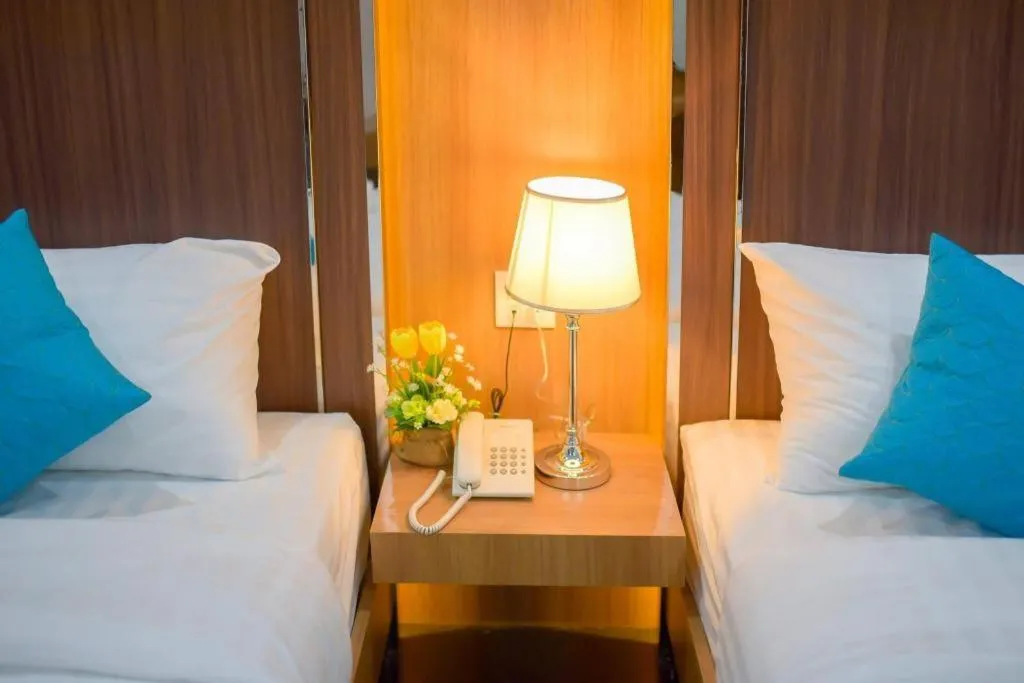 Bed in Thanburi Hotel