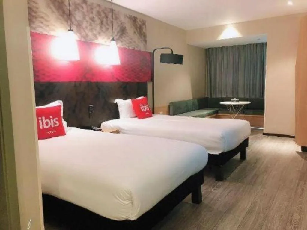 Bed in ibis Wuxi Jiangnan University