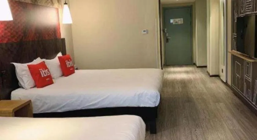 Bed in ibis Wuxi Jiangnan University
