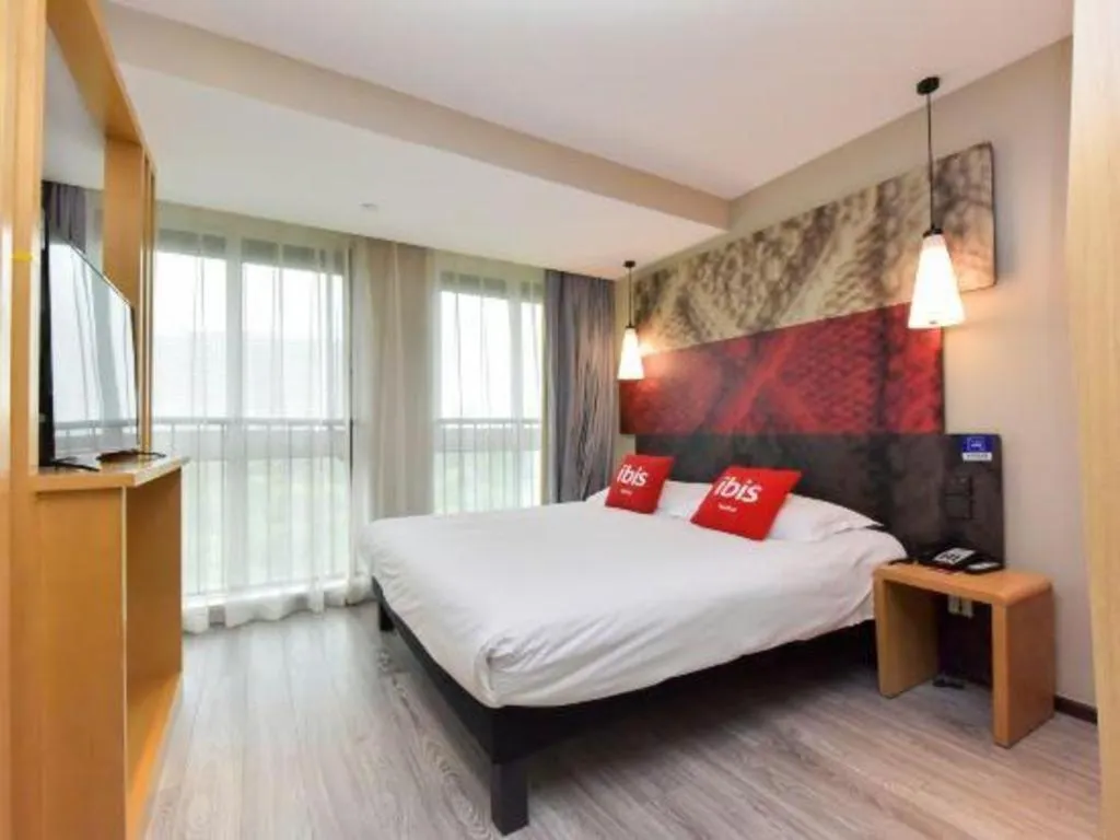 Bed in ibis Wuxi Jiangnan University