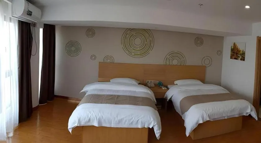 Bed in GreenTree Inn Anqing Qianshan County Sunshine City Express Hotel