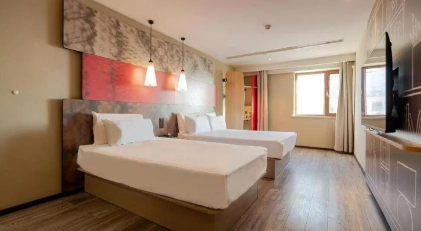 Bed in Ibis Harbin Normal University