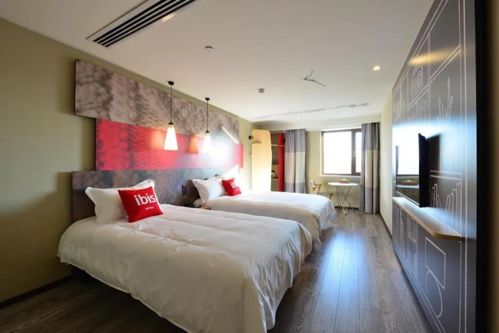 Bed in Ibis Harbin Normal University
