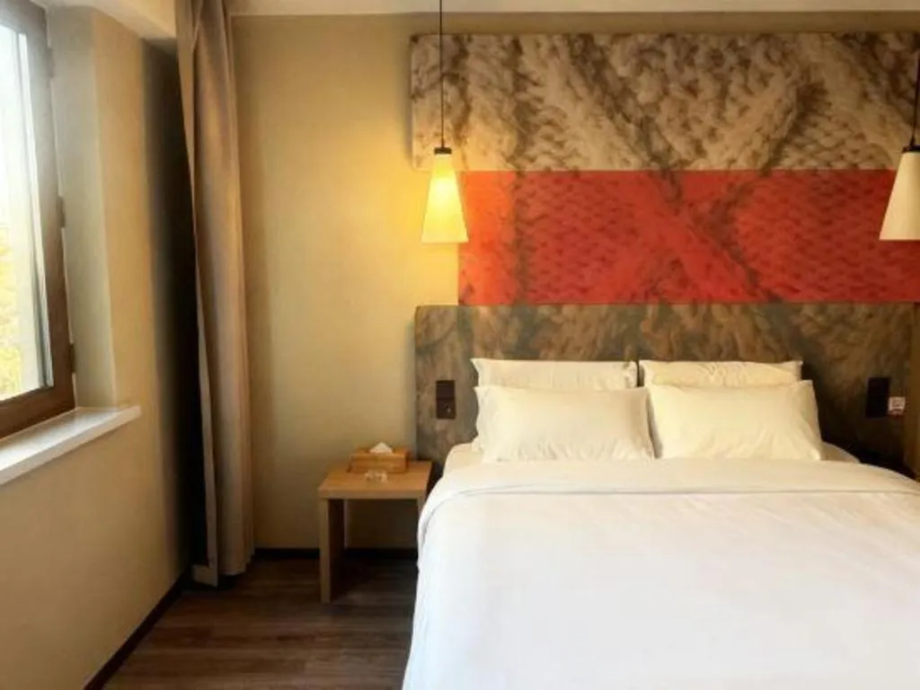 Bed in Ibis Harbin Normal University