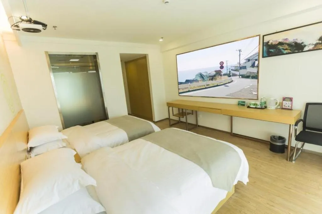 Bed in GreenTree Inn Yancheng Jiefang Road Express Hotel