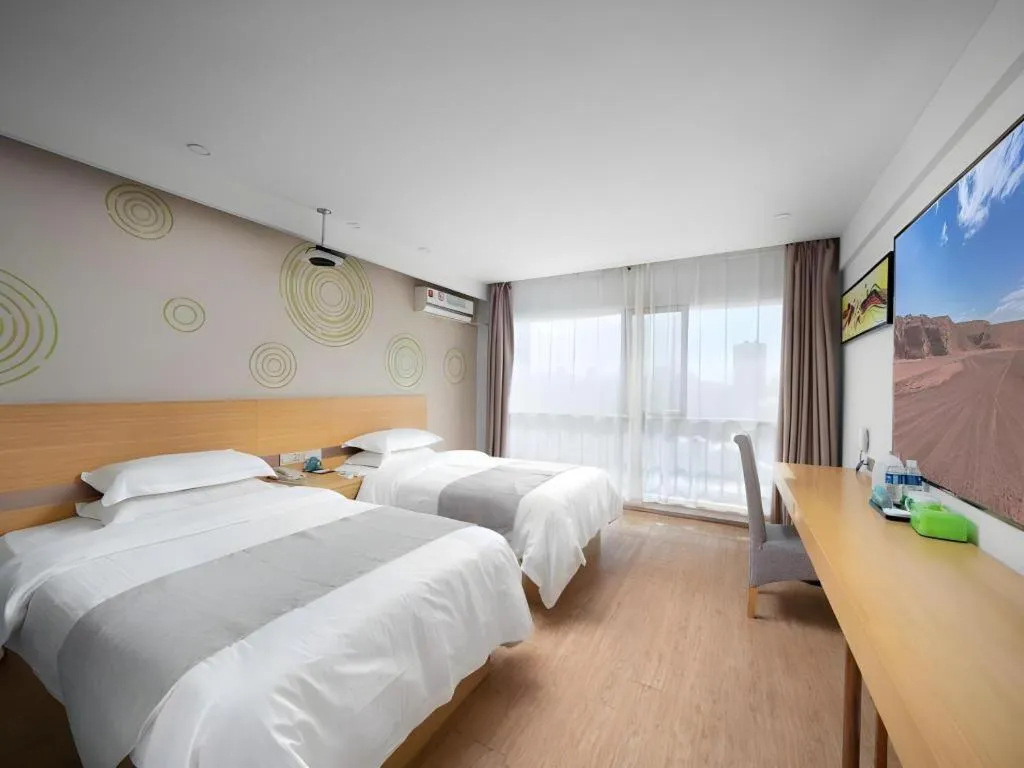 Bed in GreenTree Inn Yancheng Jiefang Road Express Hotel