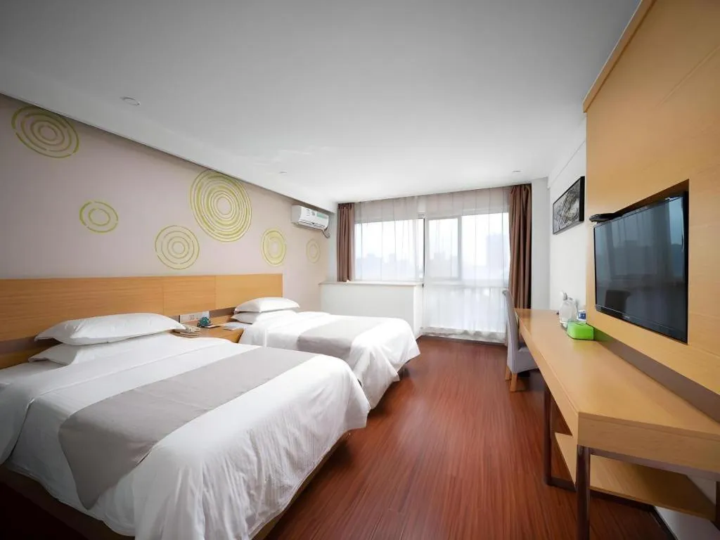 Bed in GreenTree Inn Yancheng Jiefang Road Express Hotel
