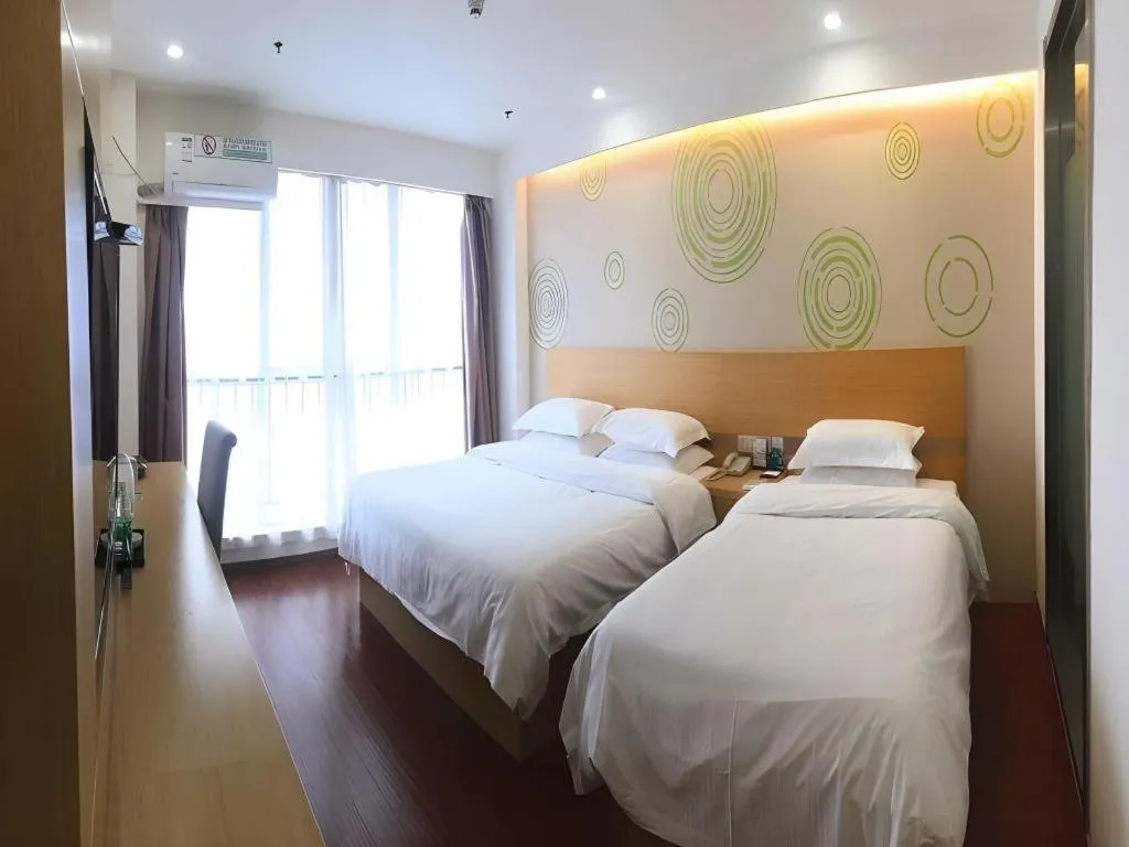 Bed in GreenTree Inn Yancheng Jiefang Road Express Hotel