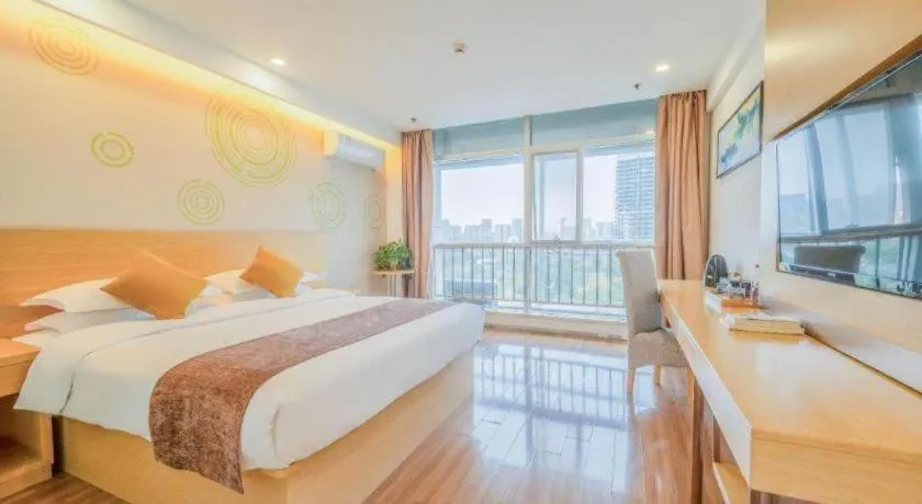 Bed in GreenTree Inn Yancheng Jiefang Road Express Hotel