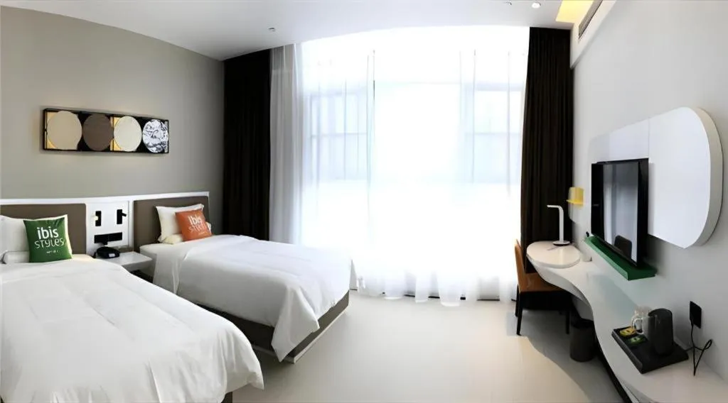Bed in ibis Styles Kunming Nanping Hotel