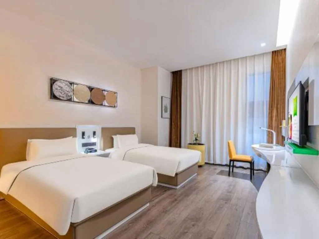 Bed in ibis Styles Kunming Nanping Hotel