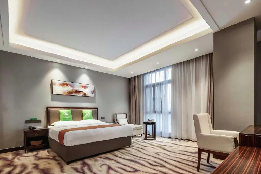 Bed in ibis Styles Nanjing Qilin Gate Hotel
