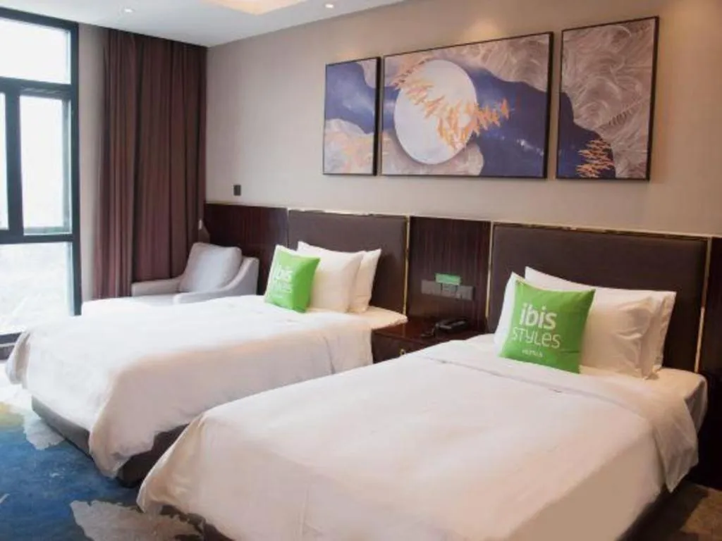 Bed in ibis Styles Nanjing Qilin Gate Hotel