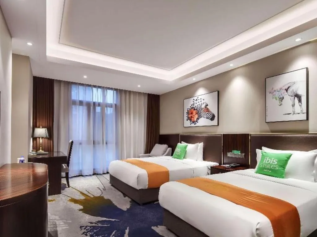 Bed in ibis Styles Nanjing Qilin Gate Hotel