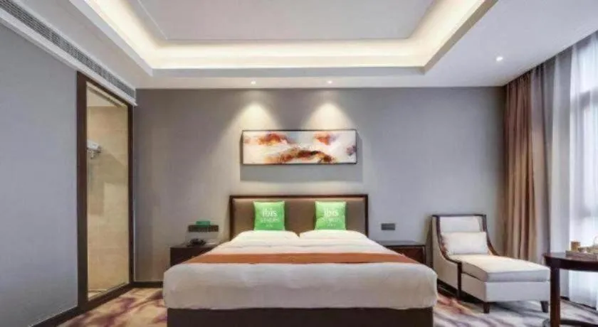Bed in ibis Styles Nanjing Qilin Gate Hotel