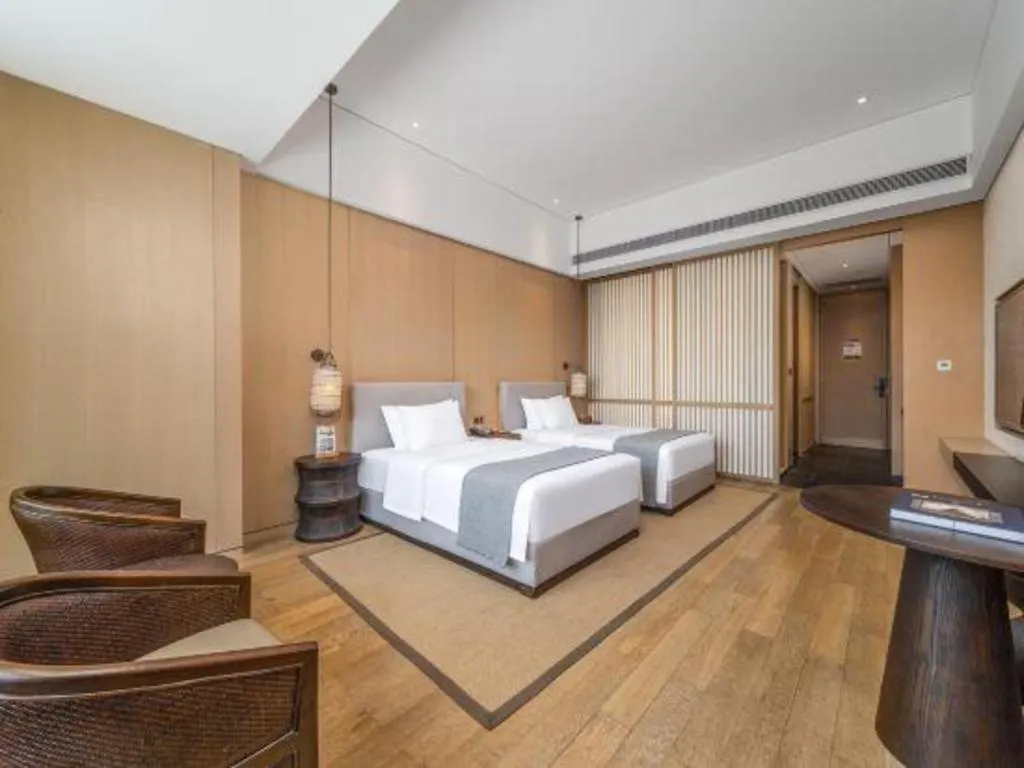 Bed in Jolie Vue Boutique Hotel Sanjiang