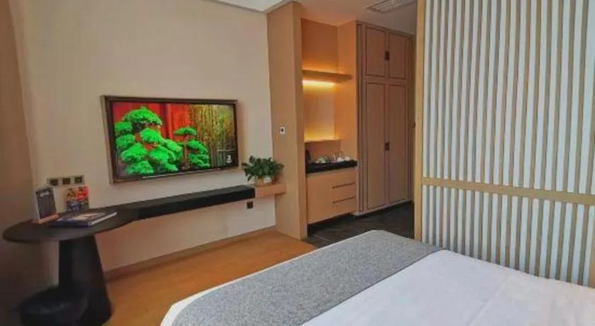 Bed in Jolie Vue Boutique Hotel Sanjiang