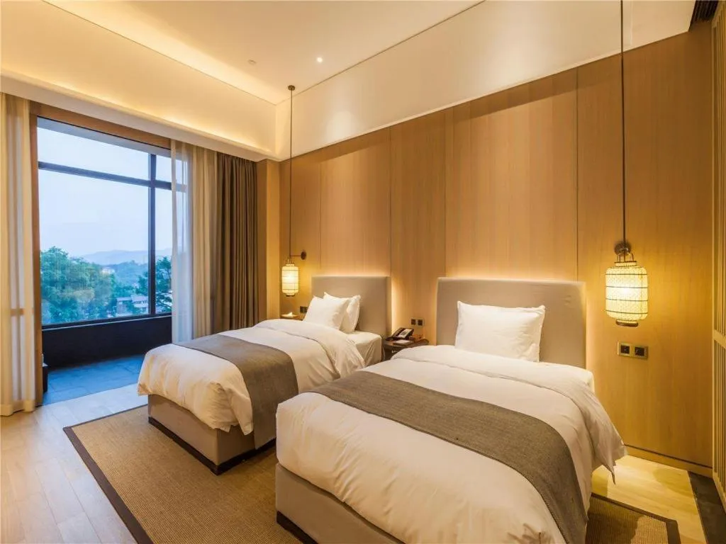 Bed in Jolie Vue Boutique Hotel Sanjiang