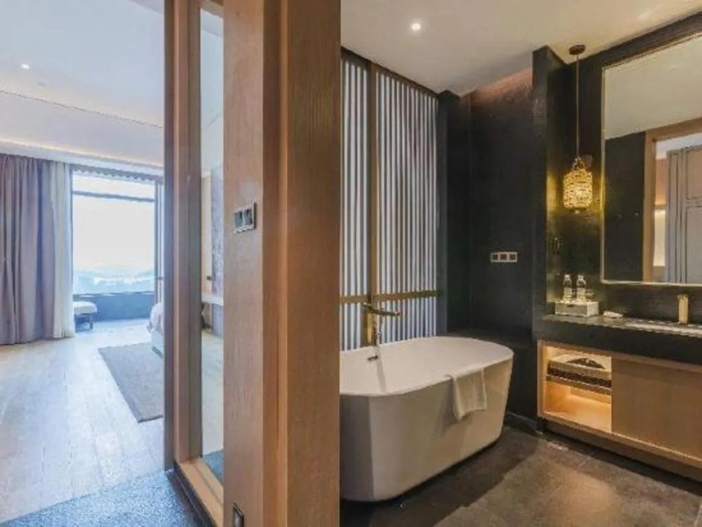 Bed in Jolie Vue Boutique Hotel Sanjiang