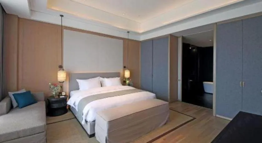 Bed in Jolie Vue Boutique Hotel Sanjiang