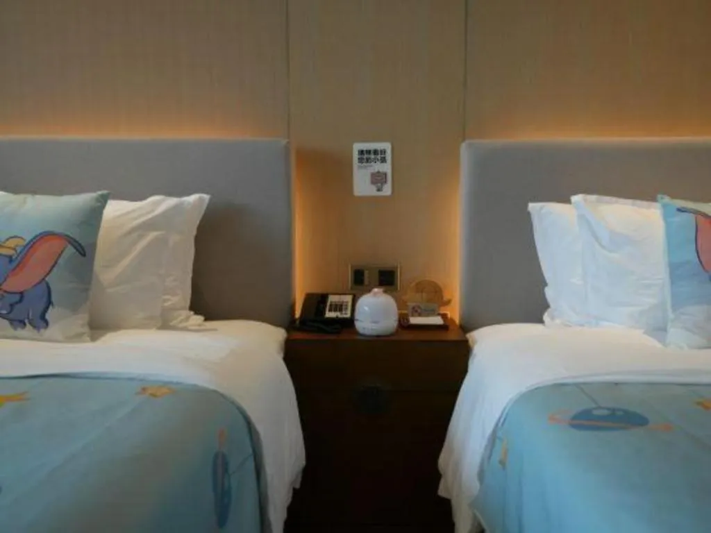 Bed in Jolie Vue Boutique Hotel Sanjiang